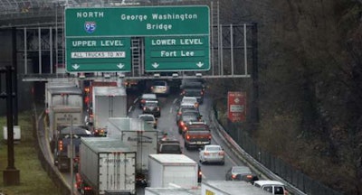 Semi trucks and vehicles stuck in traffic