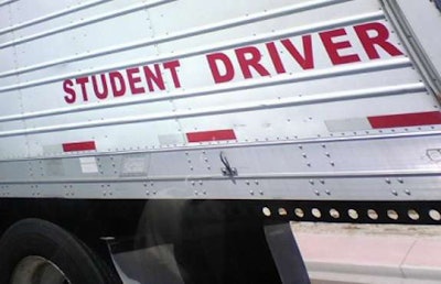 Truck trailer with student river written on the side