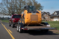 Towing Landoll LT1220 with Case skid-steer is easy work for 2015 F-350, which has a conventional tow rating of 14,000 pounds when using a weight-distributing hitch.