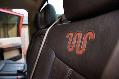 Leather stitching and embroidered King Ranch logos are found throughout the interior. High-back seats are very comfortable.