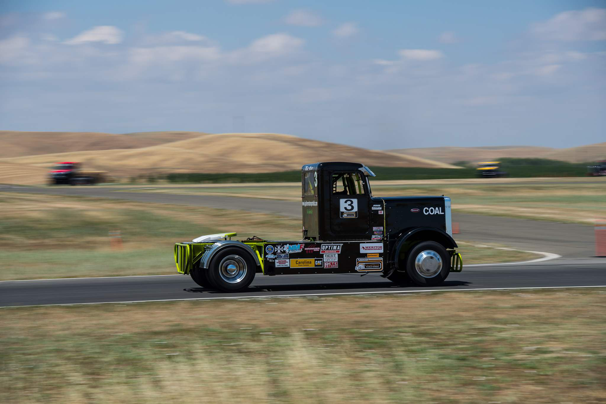 Small fleet owner Allen Boles of North Carolina races this black and green Peterbilt 359 for his Jupiter Motorsports team.