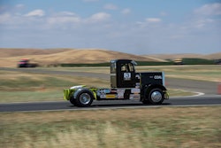 Small fleet owner Allen Boles of North Carolina races this black and green Peterbilt 359 for his Jupiter Motorsports team.