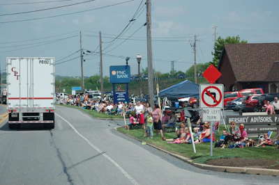Spectators line the convoy route.