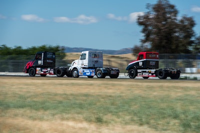 Minimizer's No. 54 'Team Tortured,' Krisztian Szabos's No. 23 Bendix Volvo and Weller's No. 11 Optima Batteries Freightliner.