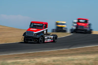 Corry Weller's No. 11 Freightliner leading the pack.