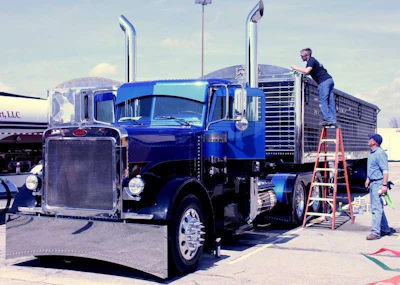 Brian Davis works on the Davis Brothers' 2005 Peterbilt