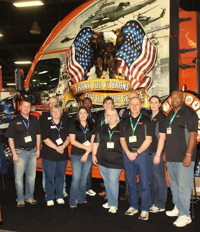 The Schneider staff at their booth