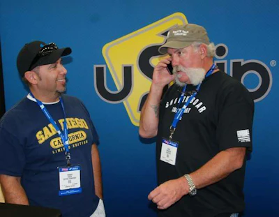 'Shipping Wars' star Marc Springer (left) at the uShip Booth with Thomas Garza of Sutton Transport