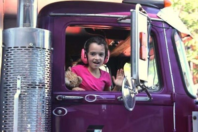 A young Brockway fan in the parade of trucks.