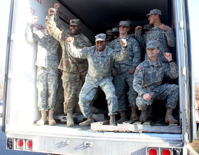 West Point cadets after unloading the Perdue truck