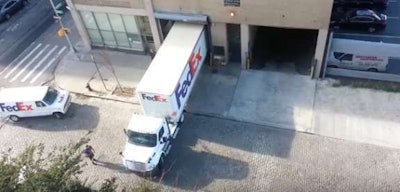 fedex-driver-backs-up