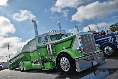 Bill Rethwisch's 2013 Peterbilt 389 and 2012 Polar tanker, shown by Jeff Schultz at the 75 Chrome show, won first place in the Combo - 2013 & Newer category, as well as first place in the Interior - OEM Sleeper category and several other awards.