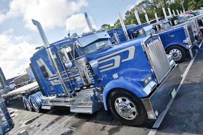 Brian Fretwell's 2016 Kenworth W900L and 2015 MAC flatbed won third place overall in the Limited-Mileage Combo category.