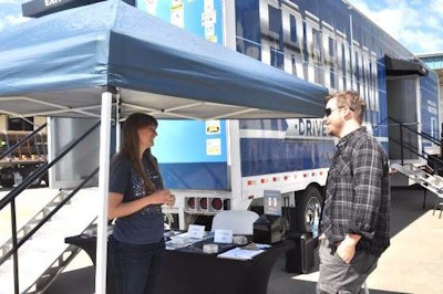 Helen Van Dam, the director of the Freedom Drivers Project, talks with a Boyd Brothers employee about how the trucking industry can help combat human trafficking.