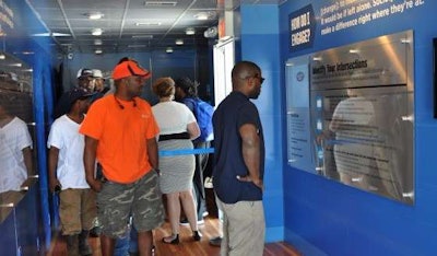 Boyd Brothers employee walk through the Freedom Drivers Project trailer.