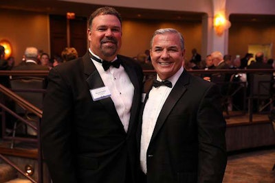 TCA Chairman Russell Stubbs (left) and Randall-Reilly’s Mike Reilly pose for a photo before the dinner portion of the evening. (TCA Photo)