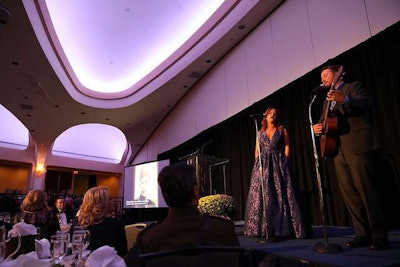 Nashville recording artists Lindsay Lawler and Chris Roberts perform “Freedom Son” during the gala. The song accompanied a video, “Trucking’s Fallen Heroes,” which featured photos and information about those who made the ultimate sacrifice. (TCA Photo)
