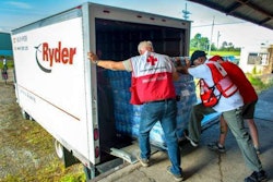 American Red Cross volunteers load relief items onto a relief truck. (Image Courtesy of Marko Kokic/American Red Cross)