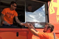 Hirschbach President & CEO Brad Pinchuk serves lunch at a Truck Driver Appreciation event.
