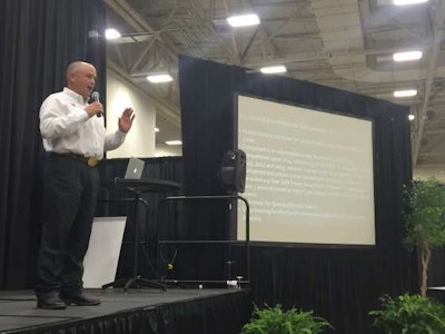 Eric James of America's Road Team speaks during the Trucking's Top Rookie ceremony at the Great American Trucking Show.