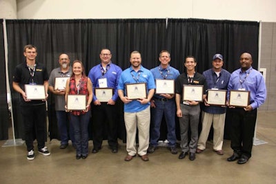 The nine finalists for the 2016 Trucking's Top Rookie award stand together after the ceremony at the Great American Trucking Show.