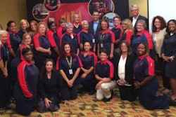 Texas Trucking Association President and CEO John Esparza (back row center) with drivers and officials for Saia.