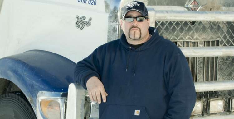 2 die when their car hits log truck of 'Ice Road Truckers' star