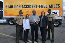 YRC honored Joe Brown (center). Joining him (from left) were Lt. Cary Hopkin-THP, Donna Tomlinson-TTA, Stephanie Mann-FMSCA and Lt. Greg Ogie