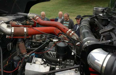 Mack fans look over one of the many trucks on display at Gerhart’s Machinery.