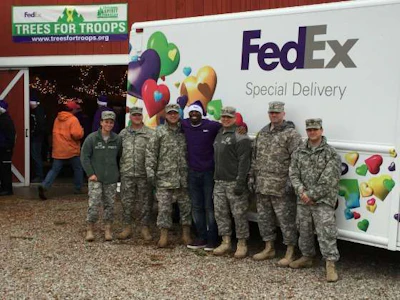 FedEx Freight drivers will help deliver Christmas trees to U.S. military bases. (Image Courtesy of FedEx)