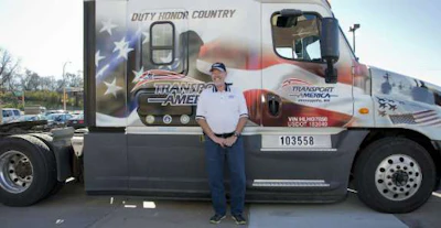 Transport America recognizes one of their drivers and military veteran Robert Harp, on Veteran’s Day with a custom military truck wrap. Robert was in the Army Airborne having two years of active duty and 25 years in the reserves. Robert has been a driver with Transport America since 1998. (Transport America photo)