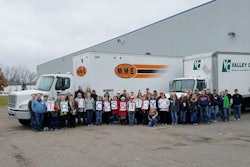 Volunteers load trucks with toys for the Trucks & Toys campaign in Minnesota. (Image Courtesy of Minnesota Trucking Association)