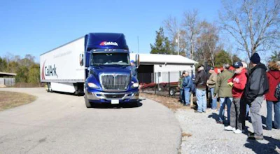 The Wreaths Across America delivery truck arrives at Alabama National Cemetery. There were 482 boxes of wreaths, with nine wreaths a box, on the truck.