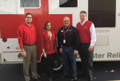 Red Cross of East Tennessee board member Lori Tucker (second from left) and Red Cross of Northeast Tennessee board member Clark Parker (second from right) thank Averitt Express’ Keith Davis (left) and Bryan Snyder (right) for Averitt’s $10,000 donation to the American Red Cross.