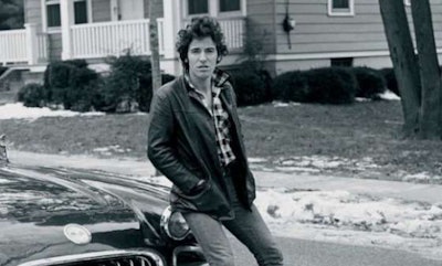 A young Bruce Springsteen on the cover of his audiobook, “Born to Run.”