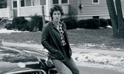 A young Bruce Springsteen on the cover of his audiobook, “Born to Run.”
