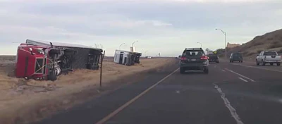 Two of the trucks toppled by high winds in Colorado