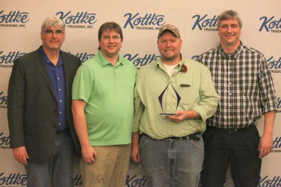 Jeff Bass (second from right) was named Kottke&rsquo;s driver of the year. With him are company President Kurt Kottke (from left), General Manager Kyle Kottke and Vice President Kory Kottke (right).