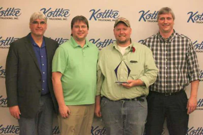 Jeff Bass (second from right) was named Kottke’s driver of the year. With him are company President Kurt Kottke (from left), General Manager Kyle Kottke and Vice President Kory Kottke (right).