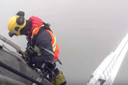 Workman on the Port Mann Bridge