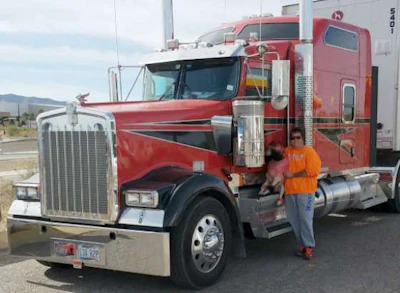 Carol Schneider and her poodle next to her truck. (Image Courtesy of Carol Schneider)