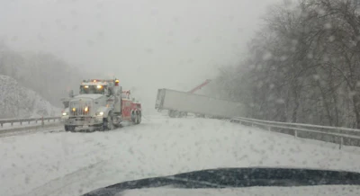 Truck needing to be towed on I-287 -- Cross Westchester Expressway -- in New York Thursday.