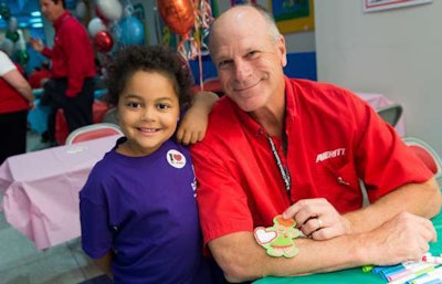 Tampa service center director Dick Wiggins spends time with a St. Jude Children’s Research Hospital patient as part of Averitt Express’ recent trip to the Memphis facility to present a donation from Averitt’s employees.