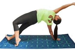 Person doing yoga on a mat