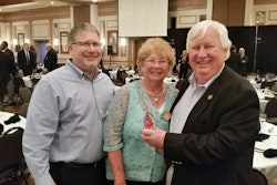 John Whittington (left), Ro Whittington (middle) and Shorty Whittington (right) with Grammer Industries’ award from the Columbus, Indiana Chamber of Commerce. (Image Courtesy of Shorty Whittington)