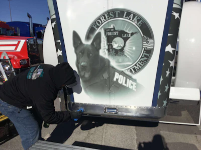 The hood of Jake and Stephanie Robak's truck honors fallen K9 officer Ranger.