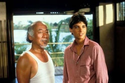 Pat Morita stars as Kesuke Miyagi and Ralph Macchio stars as Daniel LaRusso in The Karate Kid.