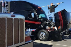 Terry Beine of Jackson, Wisconsin gets one of the many show trucks at MATS ready for the judges