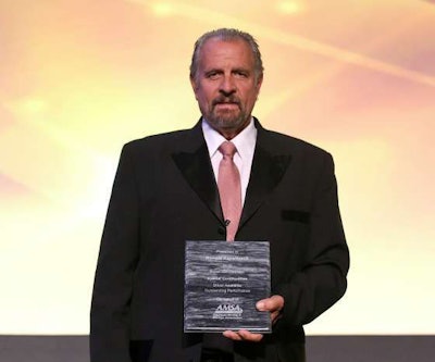 Ronald Kappellusch with his Special Commodities award at a formal ceremony by the American Moving & Storage Association. (Image Courtesy of AMSA)