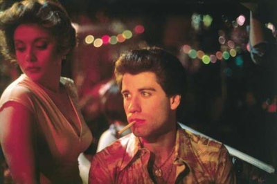 John Travolta stars in Saturday Night Fever.